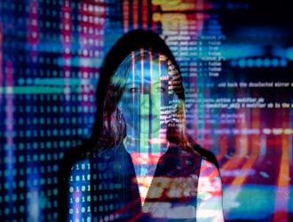 Code Projected Over Woman